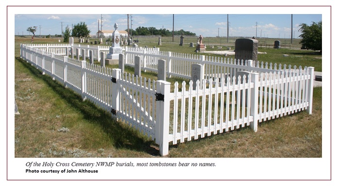 N.W.M.P. burials at Holy Cross Cemetery, Fort Macleod, behind a white picket fence